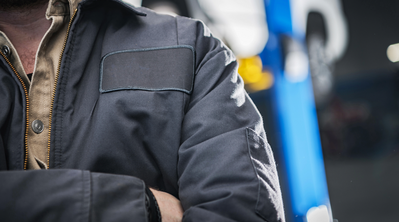Close-up of man wearing work jacket - workwear jacket - work jacket