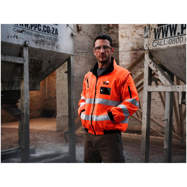 Man wearing orange reflective bunny jacket - bunny jacket - work jacket