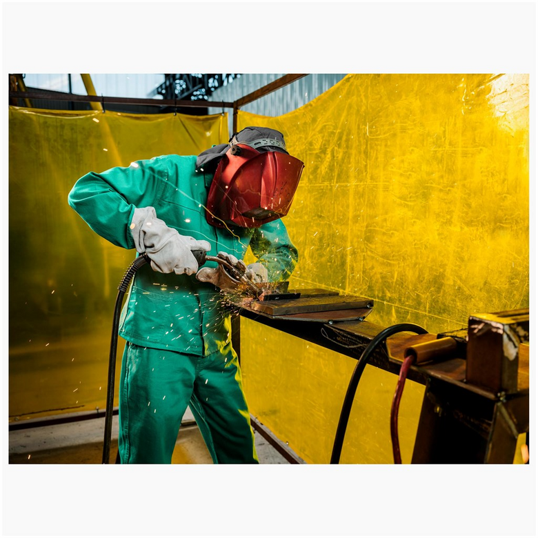Man welding in emerald green conti suit - emerald green suit - conti suits