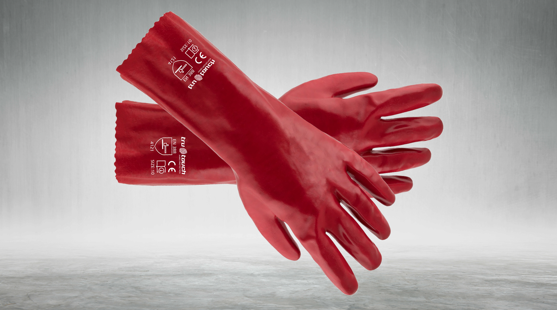 Red PVC gloves on grey background - pvc gloves - Gloves