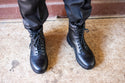 Kronos Safety Boot: Black work boot with laces, steel toe cap, durable sole, and a padded collar.