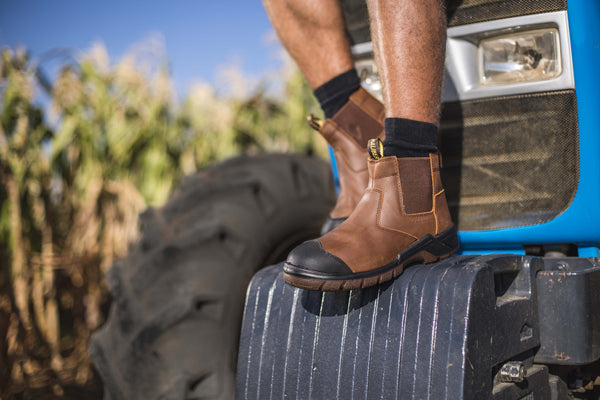 Ripsaw Safety Boot: Brown work boot with laces, full-grain leather upper, and a durable sole.