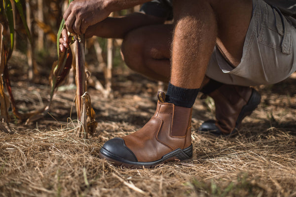 Ripsaw Safety Boot: Brown work boot with laces, full-grain leather upper, and a durable sole.