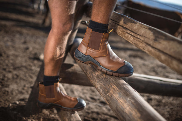 Ripsaw Safety Boot: Brown work boot with laces, full-grain leather upper, and a durable sole.