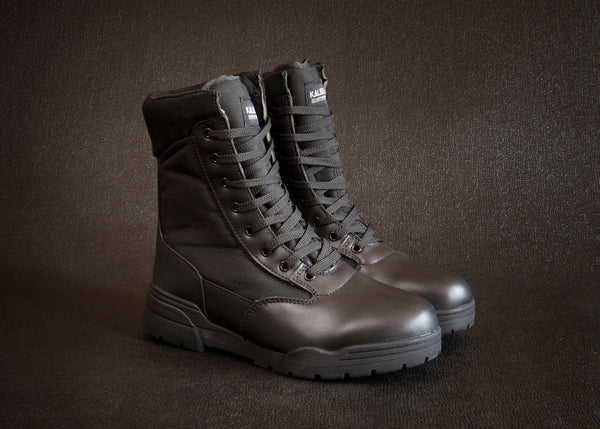 Tactical Safety Boot: Black work boot with laces, rubber outsole, and a padded collar for comfort.