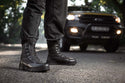 Tactical Safety Boot: Black work boot with laces, rubber outsole, and a padded collar for comfort.