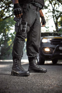 Tactical Safety Boot: Black work boot with laces, rubber outsole, and a padded collar for comfort.